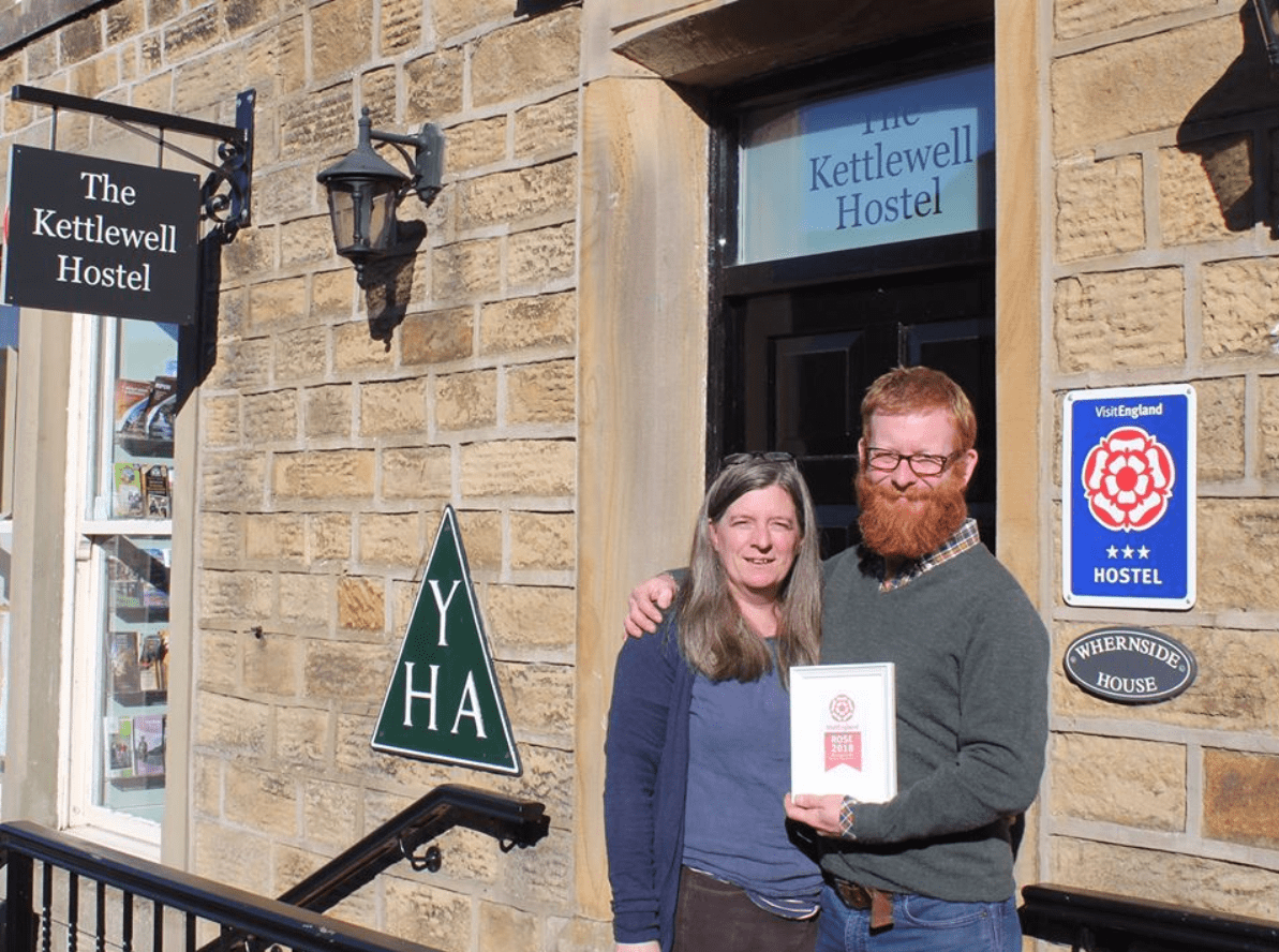 Saul and Floss Ward outside YHA Kettlewell with their ROSE Award