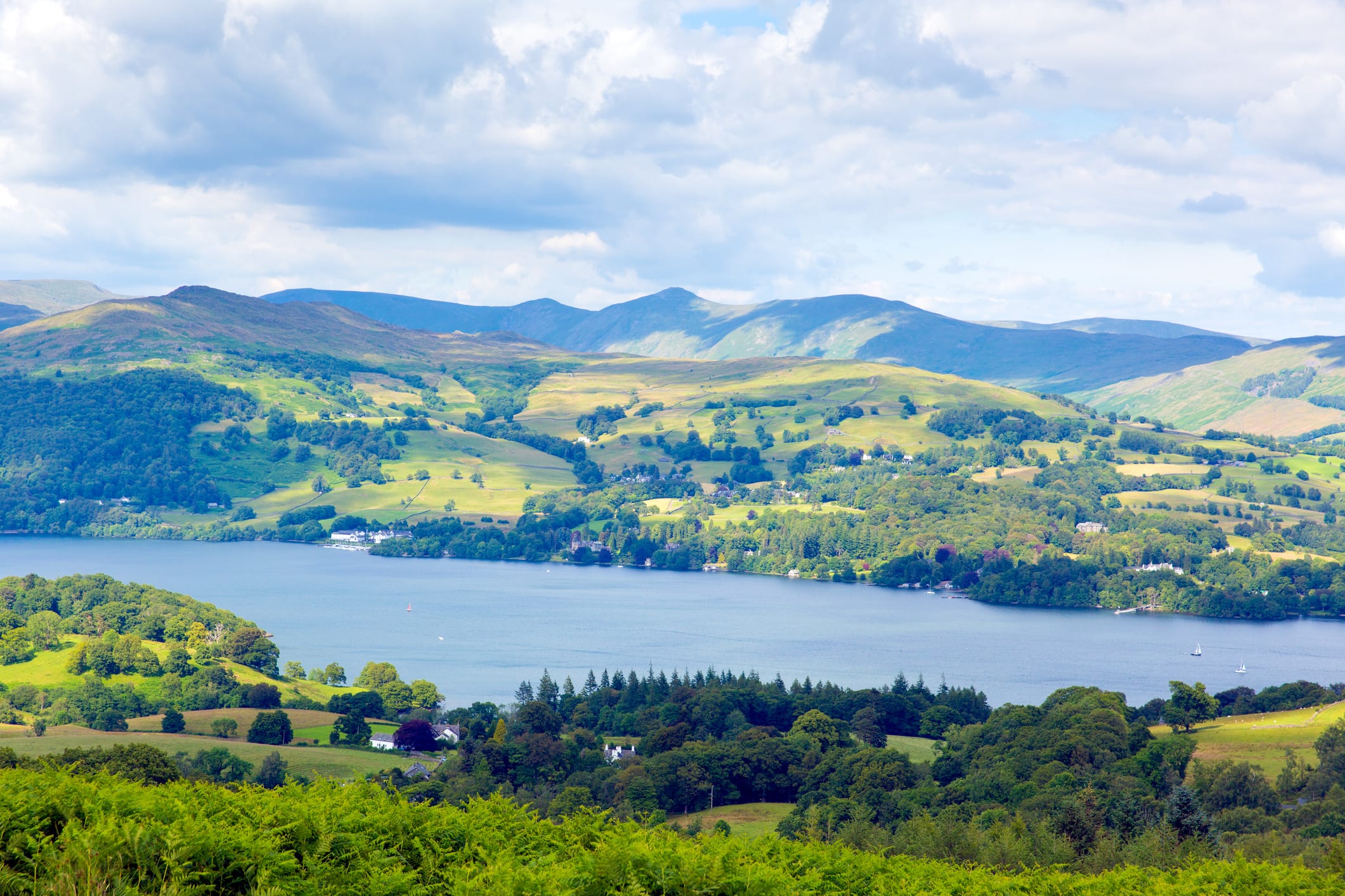 Windermere Lake District National Park England uk on a beautiful sunny summer day popular tourist attraction