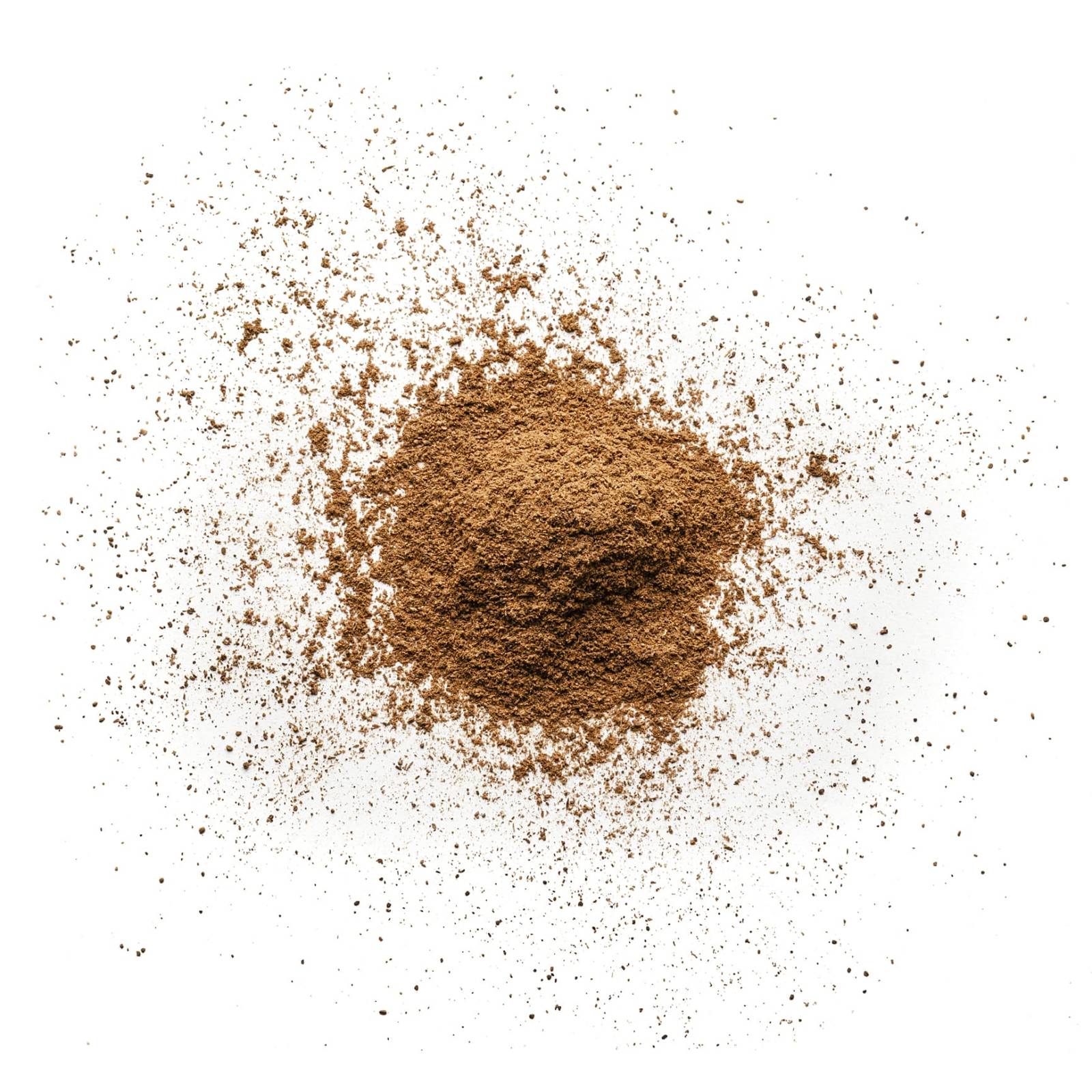 Cinnamon powder heap isolated on white background
