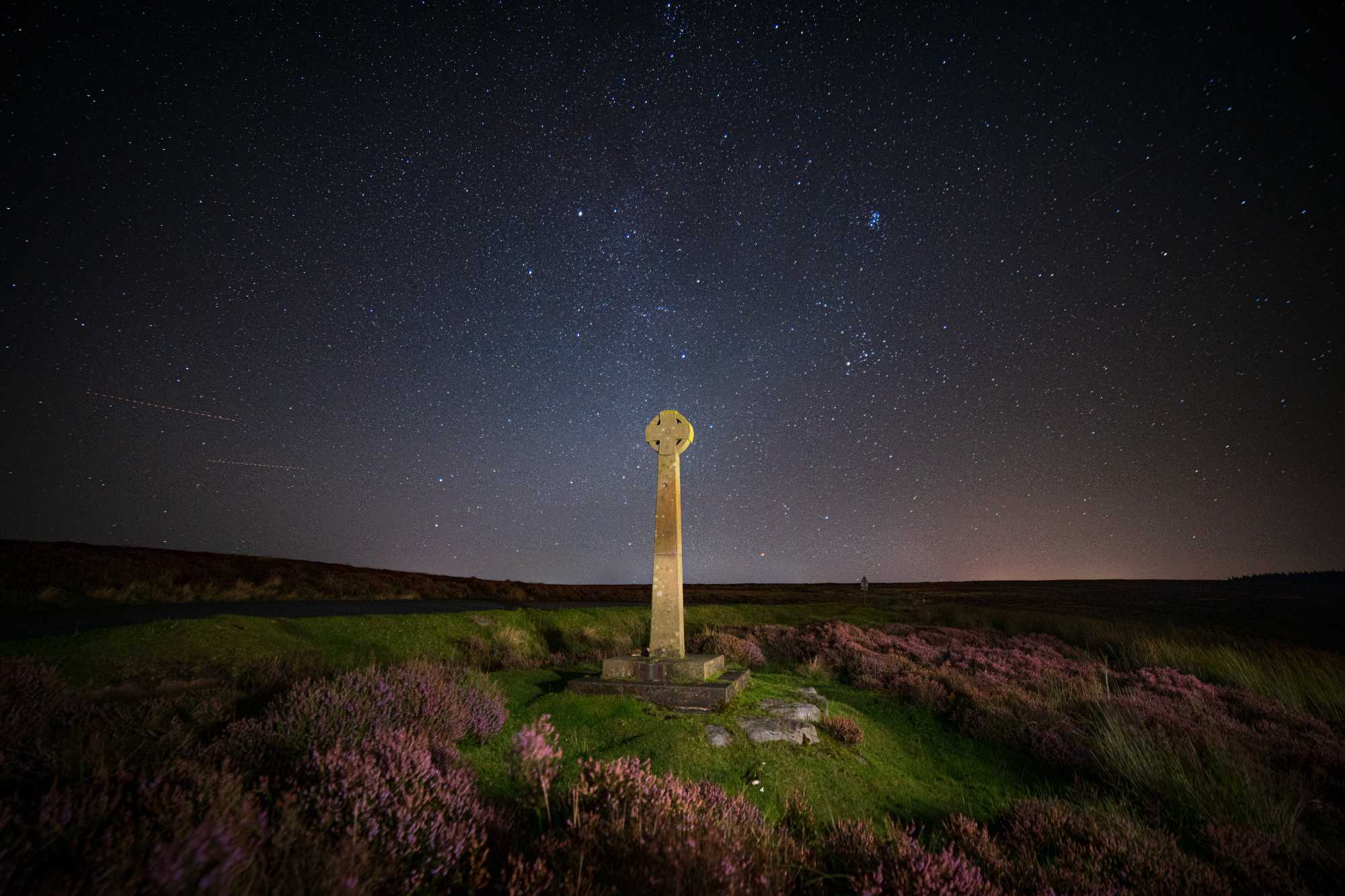 Milky way and foreground cross at North York Moors, Rosedale, UK