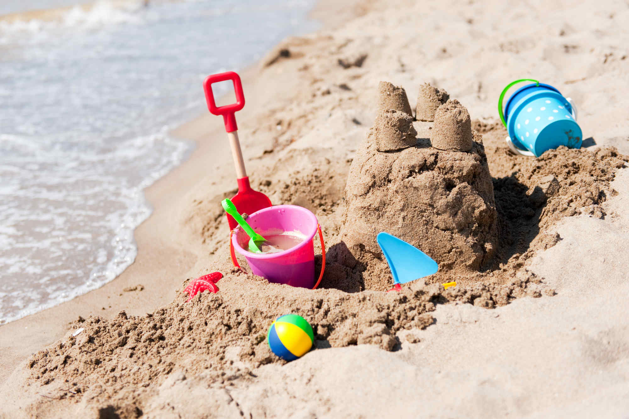 sand castle on the beach built by a child