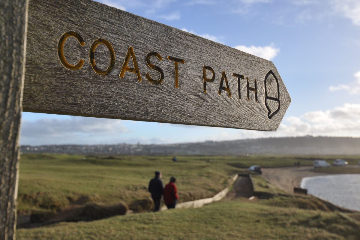 Coast path wooden sign