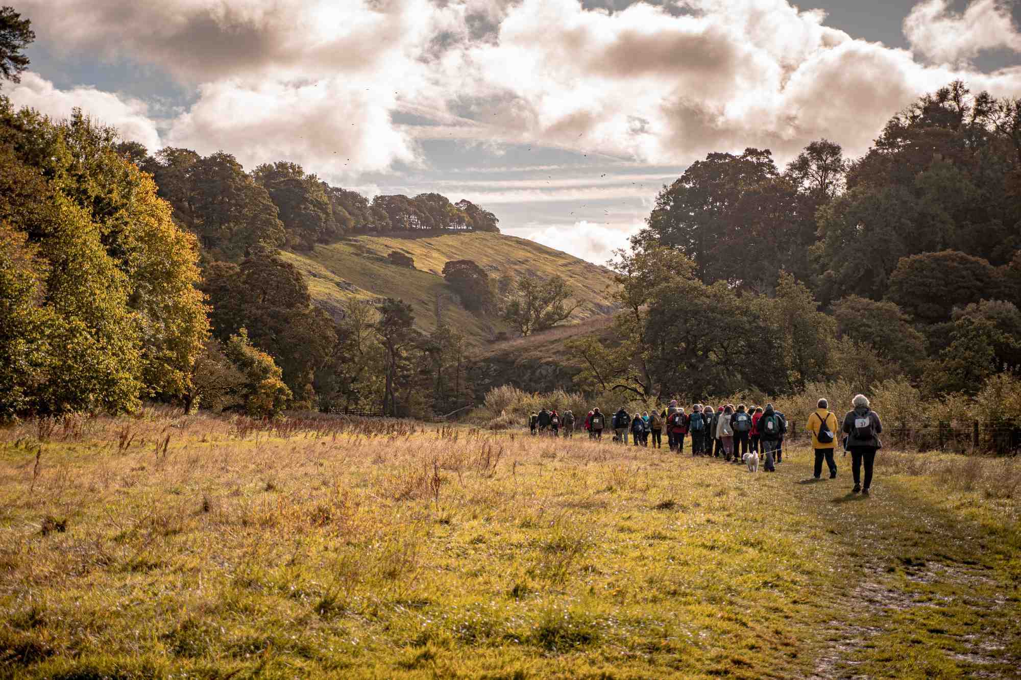 People on a walk in Hartington in autumn