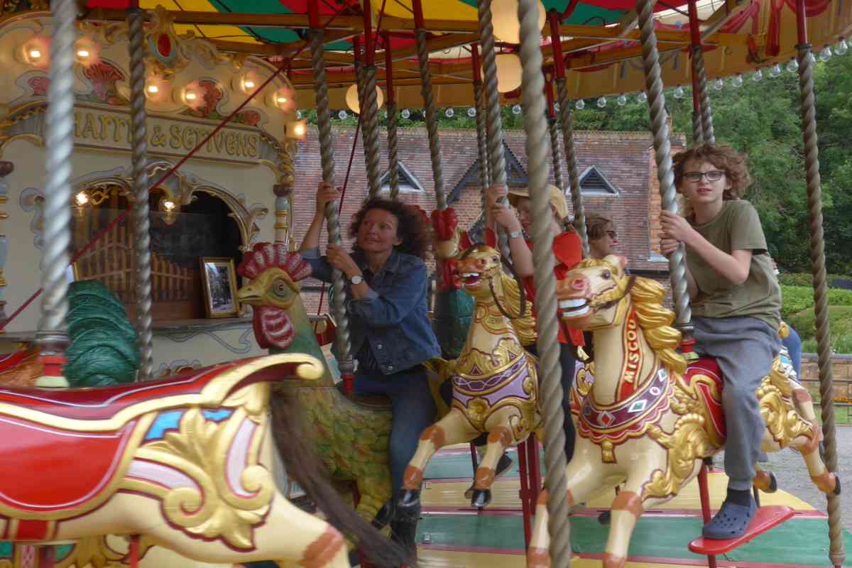 Mother and son on the Merry go Round