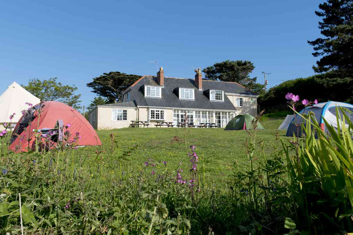 Tents in the grounds of YHA Lands End