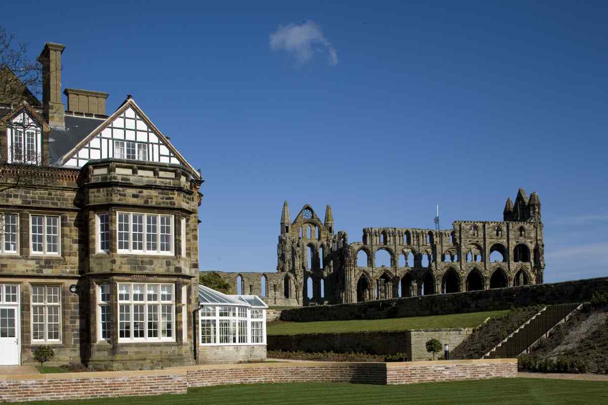 YHA Whitby exterior and Whitby Abbey