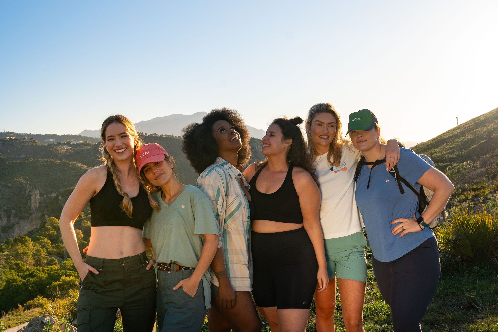 Group of women standing together in ACAI clothing