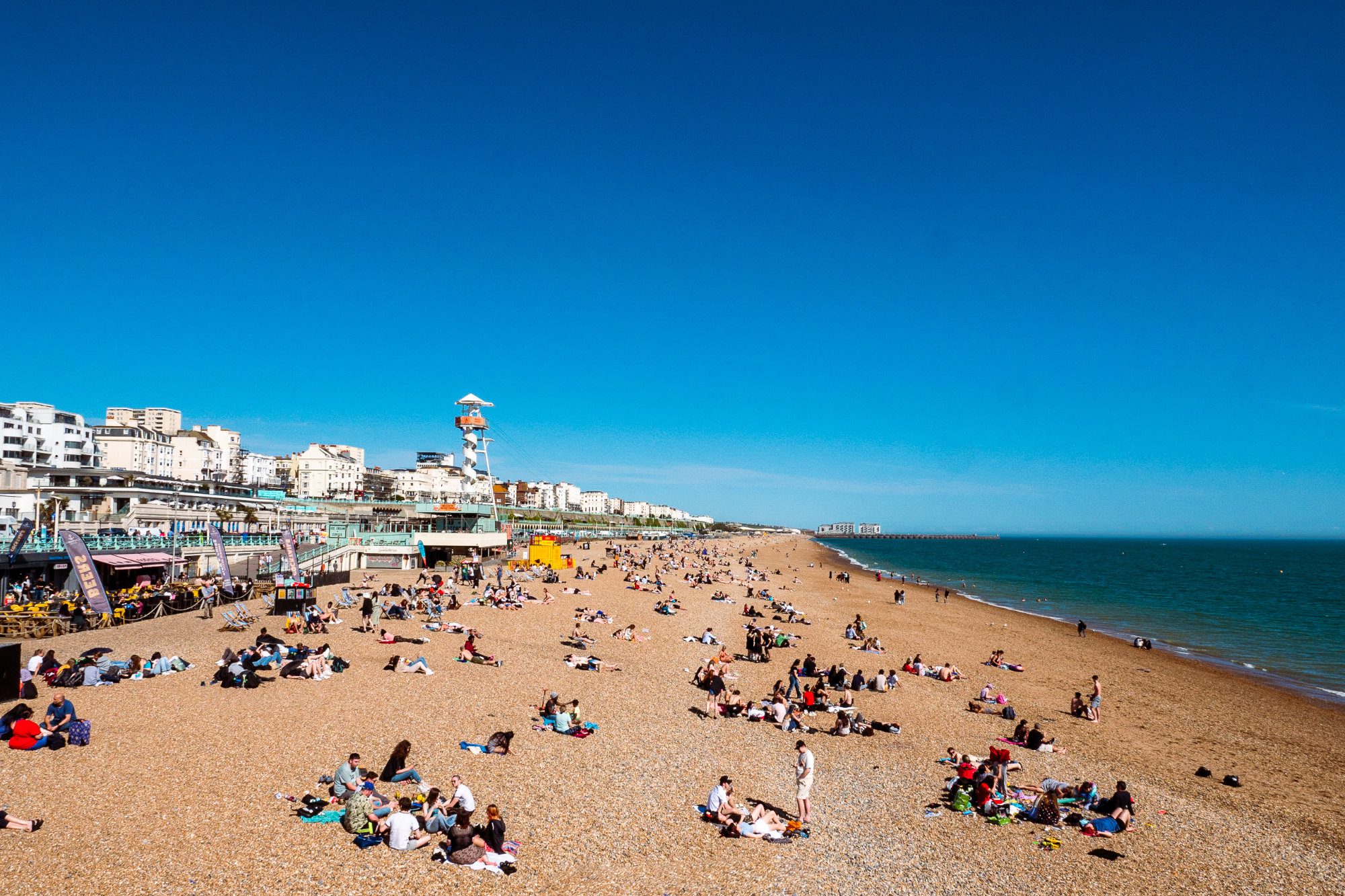 View of Brighton pier on a sunny day with blue sky