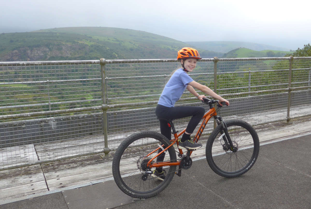 Jenny Lunnon's daughter on an orange bike