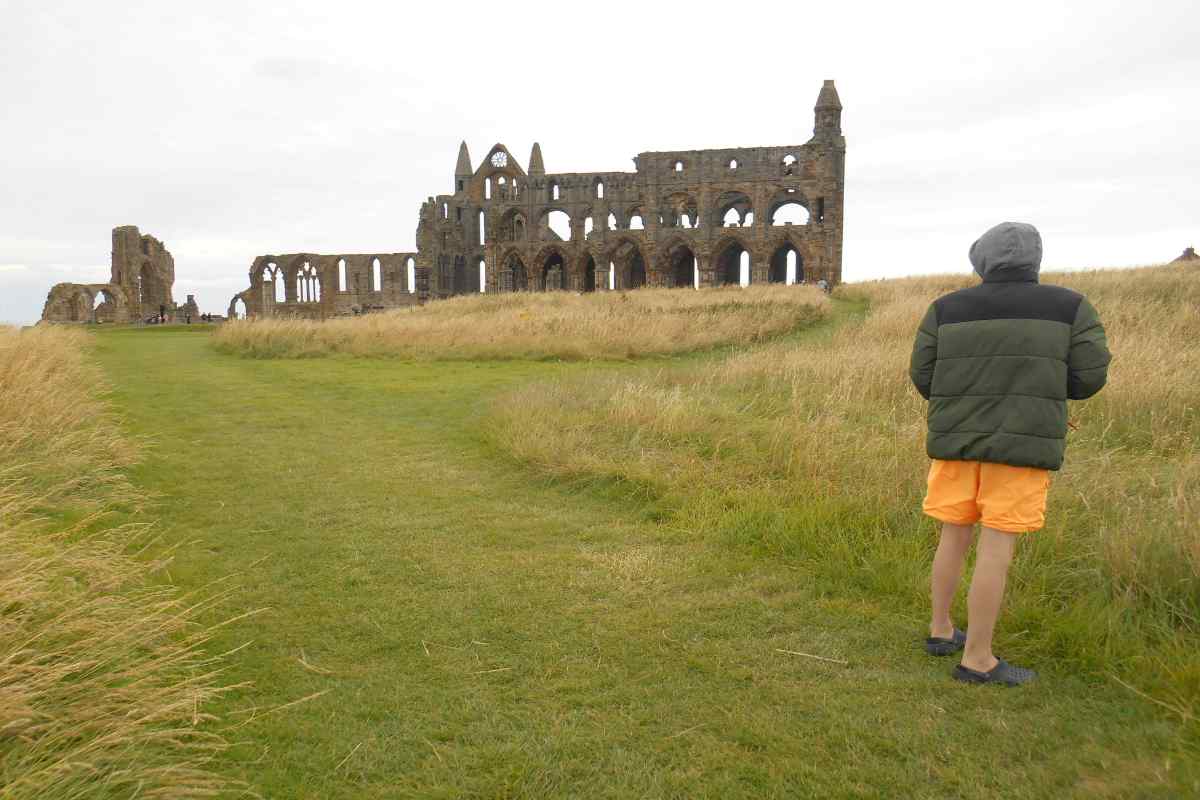 Person stood near the Whitby Abbey