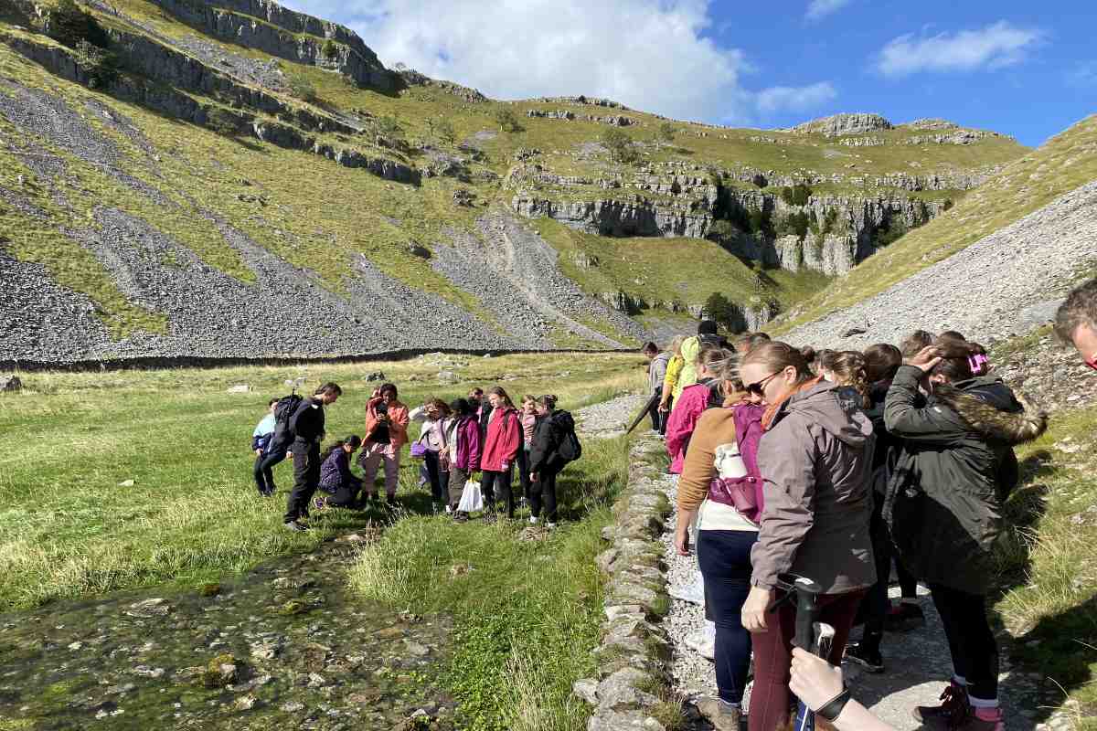 Group of young people walking in Malham